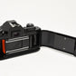 Nikon EM 35mm SLR w/Nikon Nikkor 50mm f1.8 lens, strap, cap, new seals