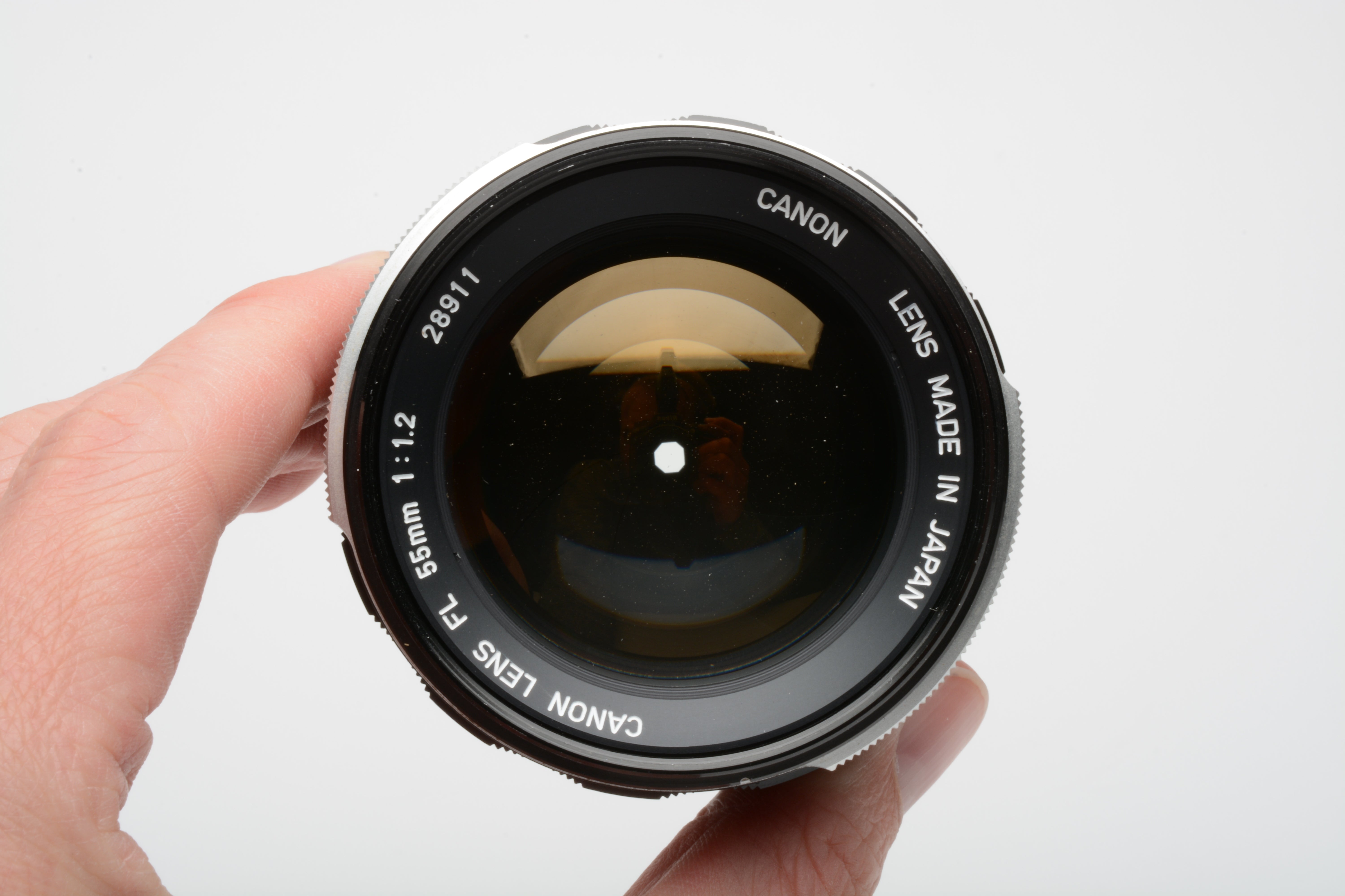 Canon FL 55mm f1.2 prime lens, caps + sky filter, very clean and sharp –  RecycledPhoto