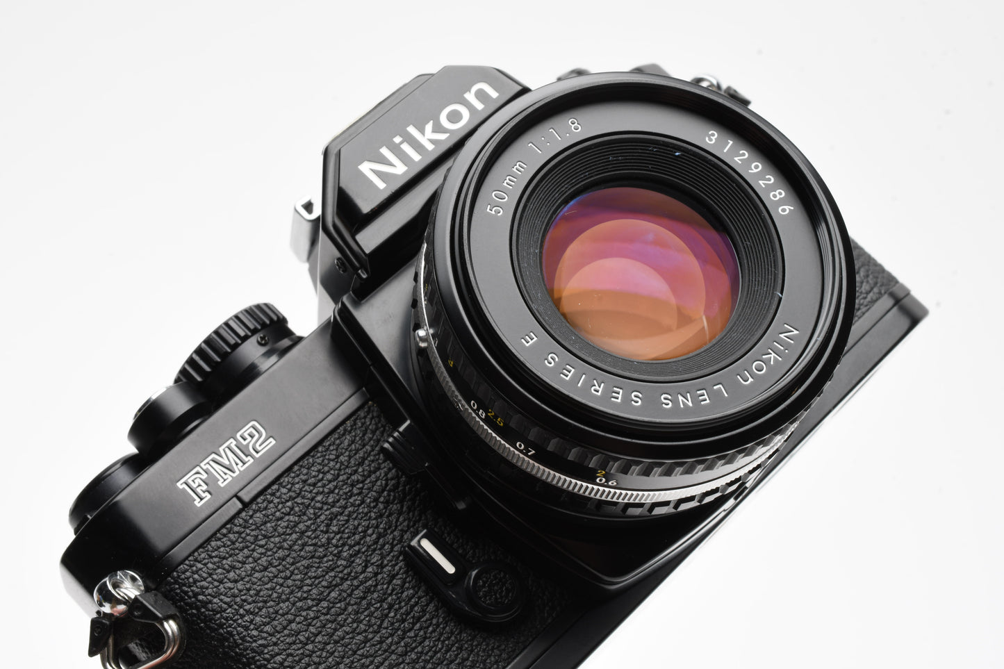 Nikon FM2 N Black 35mm SLR Body w/Nikon 50mm f1.8 Series E AI lens, new seals