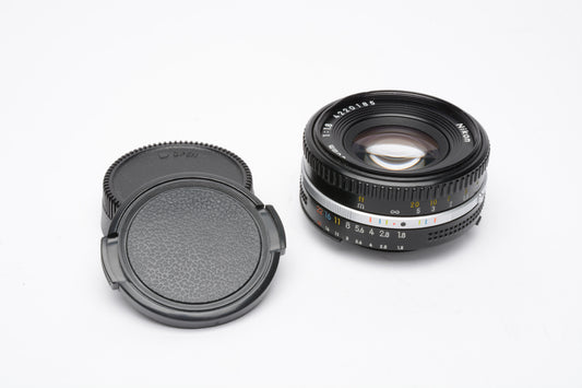 Nikon Nikkor 50mm f1.8 AI-S lens, clean, sharp, great compact prime lens + Caps