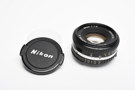 Nikon 50mm f1.8 Series E lens w/caps Chrome pancake prime lens, Nice!