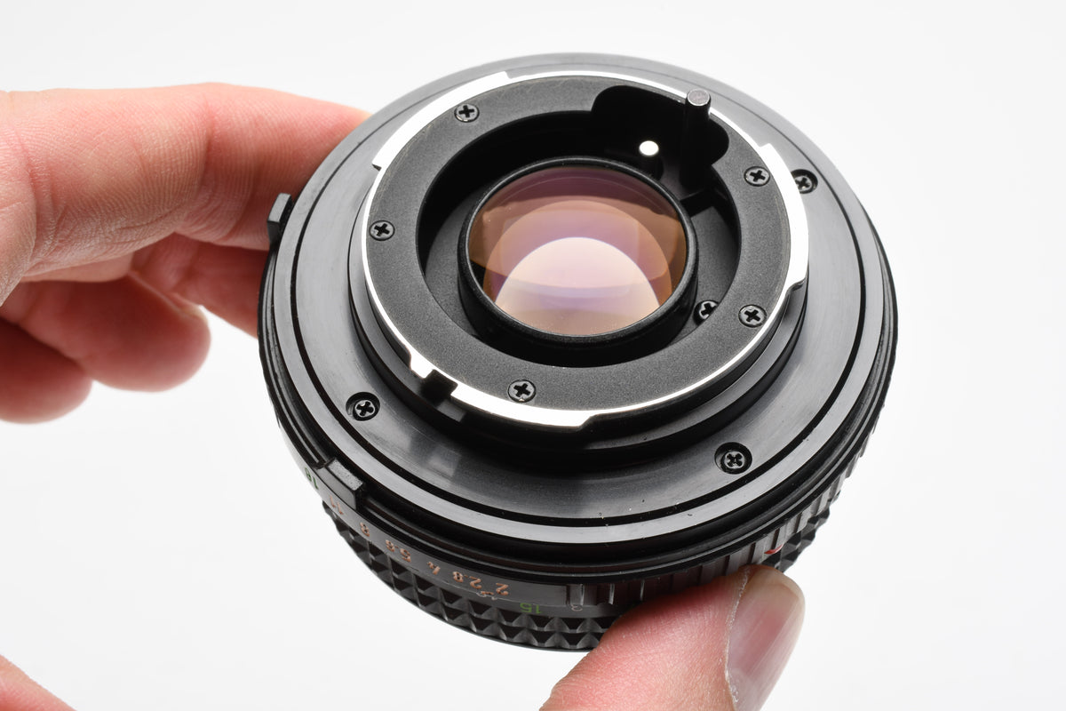 Minolta MD Rokkor-X 45mm f2 Pancake lens, lens caps, clean and sharp