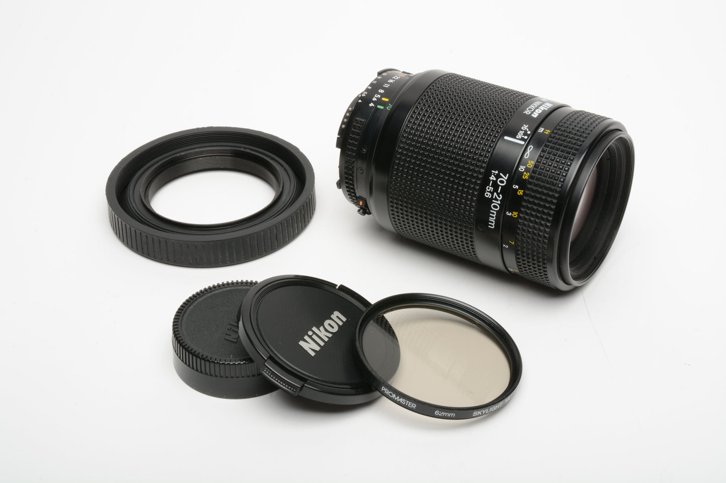 Nikon AF Nikkor 70-210mm F4-5.6 zoom lens, caps, 1A filter and rubber hood
