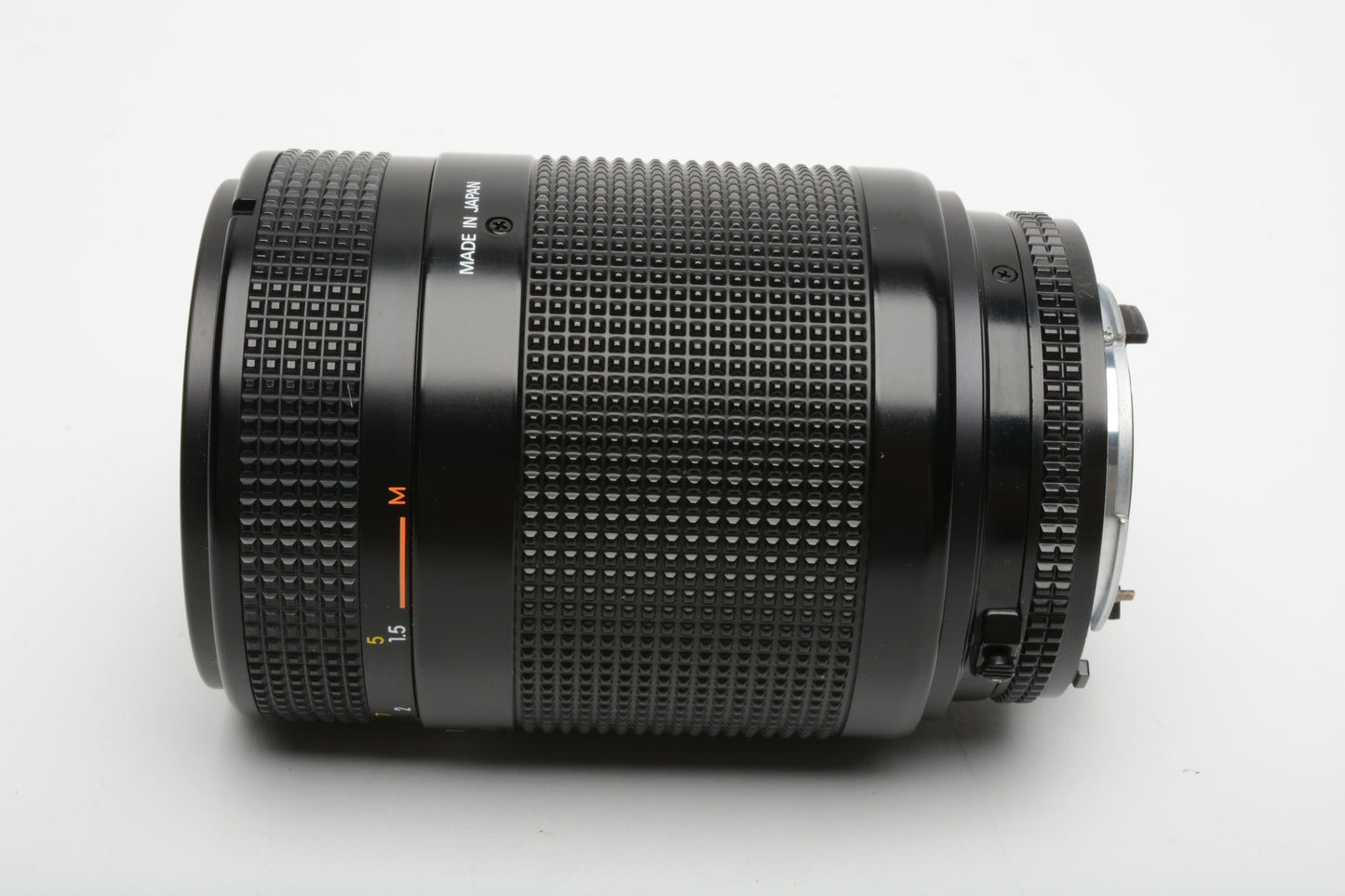 Nikon AF Nikkor 70-210mm F4-5.6 zoom lens, caps, 1A filter and rubber hood