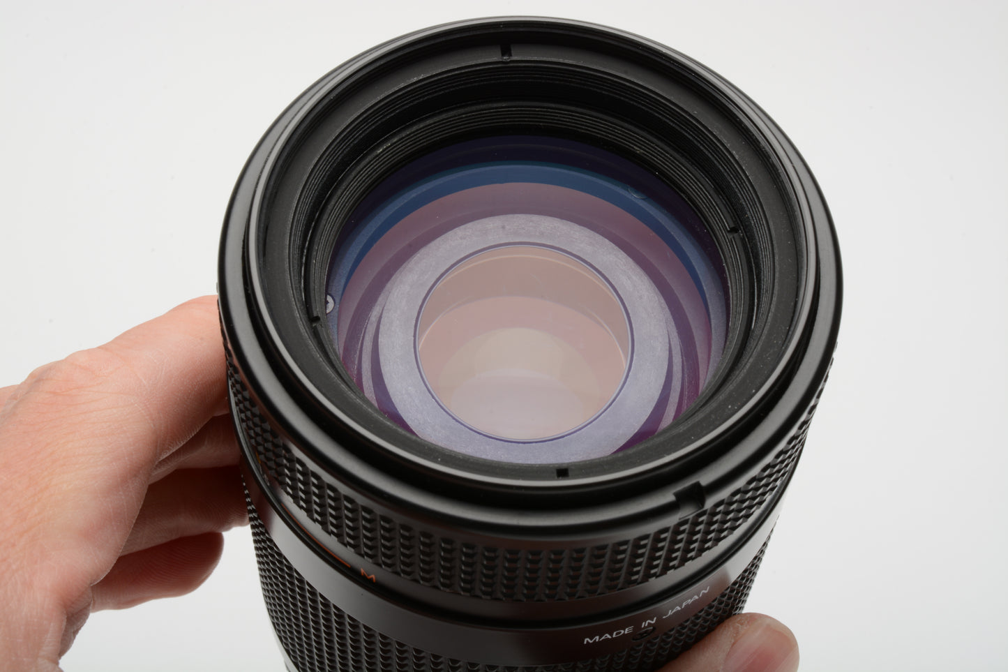 Nikon AF Nikkor 70-210mm F4-5.6 zoom lens, caps, 1A filter and rubber hood