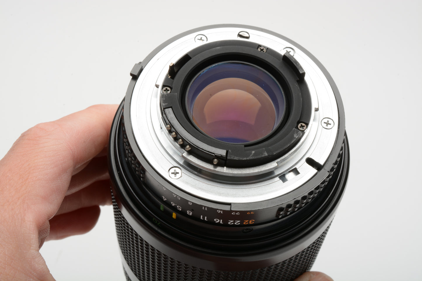 Nikon AF Nikkor 70-210mm F4-5.6 zoom lens, caps, 1A filter and rubber hood