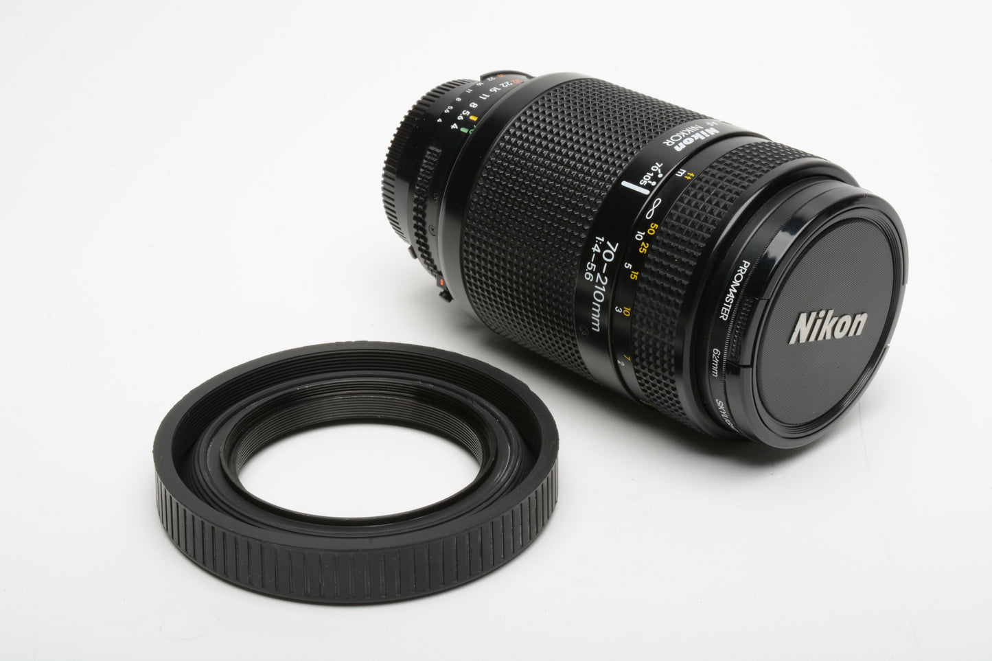 Nikon AF Nikkor 70-210mm F4-5.6 zoom lens, caps, 1A filter and rubber hood