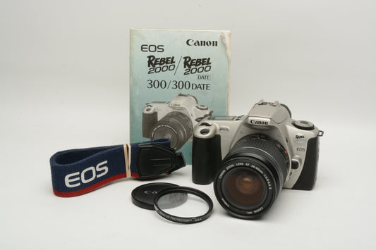 Canon Rebel 2000 35mm SLR w/EF 28-80mm f3.5-5.6 II zoom lens, strap, manual