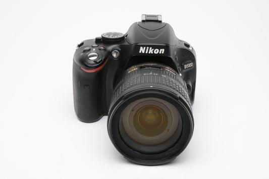 Nikon D5100 DSLR w/Nikkor 18-70mm F3.5-4.5G VR lens, 12,502 Acts, batt+charger+UV