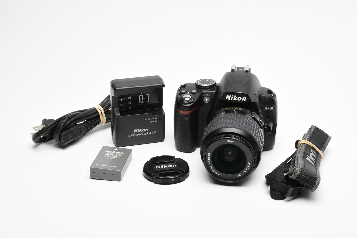 Nikon D3000 DSLR w/Nikkor AFS 18-55mm f3.5-5.6G Lens, Batt, Charger, 25K Acts