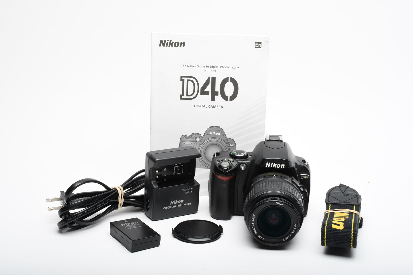 Nikon D40 DSLR body w/Nikkor 18-55mm f3.5-5.6G ED II, Batt+Charger, 12K Acts