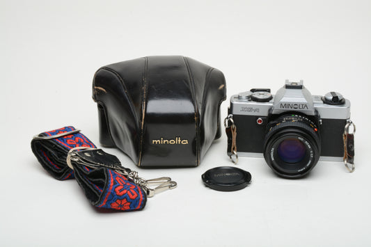 Minolta XG-A 35mm SLR w/50mm f1.7 lens, strap, cap, strap +Case, New seals, tested