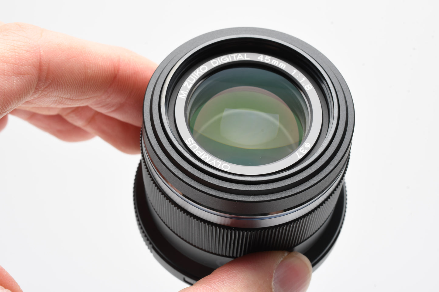 Olympus M. Zuiko Digital 45mm f1.8 MSC Micro 4/3 lens, Mint- (Black) +UV
