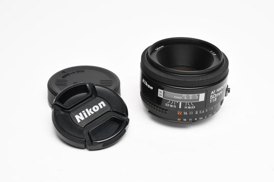 Nikon Nikkor AF 50mm f1.8 Prime lens, caps