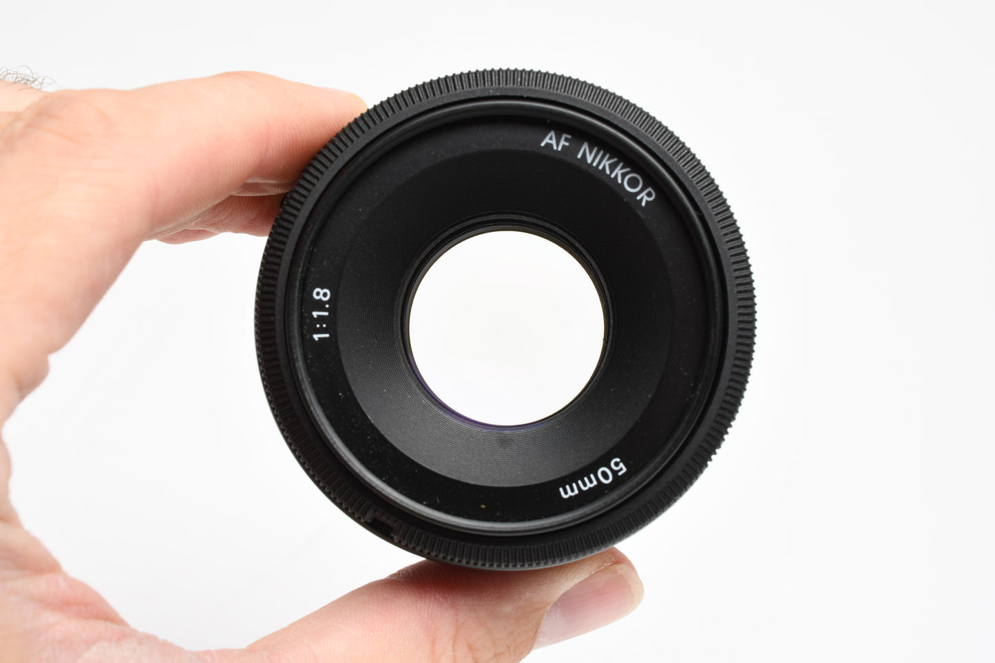 Nikon Nikkor AF 50mm f1.8 Prime lens, caps