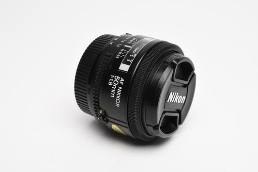 Nikon Nikkor AF 50mm f1.8 Prime lens, caps