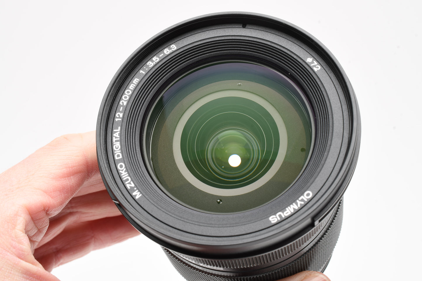 Olympus M. Zuiko Pro 12-200mm f3.5-6.3 lens, Caps, Hood, Mint-