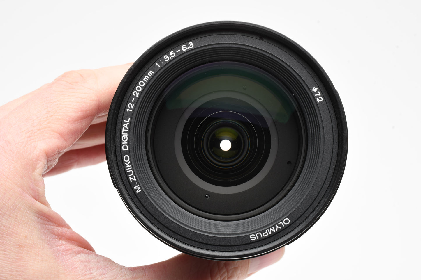 Olympus M. Zuiko Pro 12-200mm f3.5-6.3 lens, Caps, Hood, Mint-