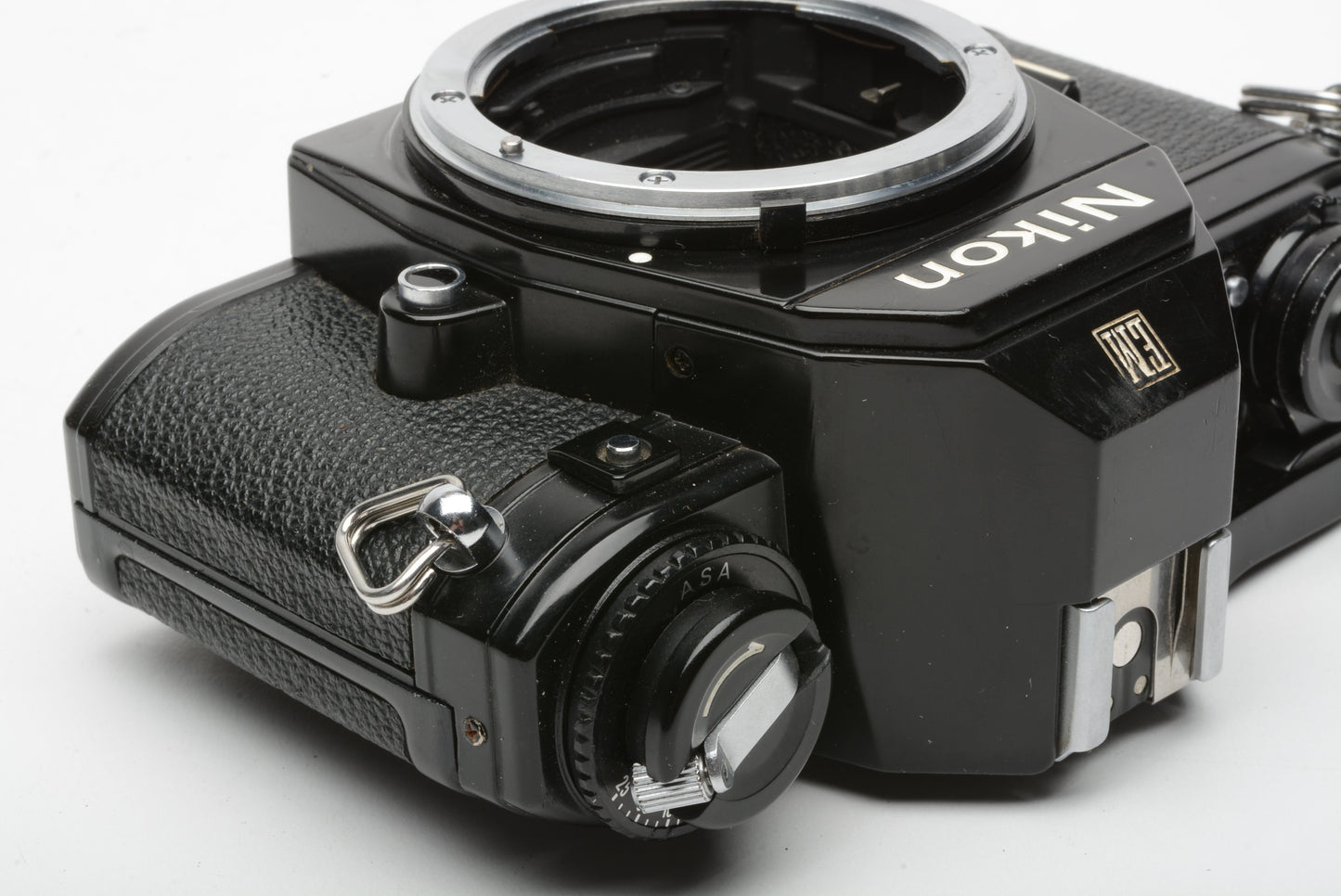 Nikon EM 35mm SLR body only, strap, cap, tested