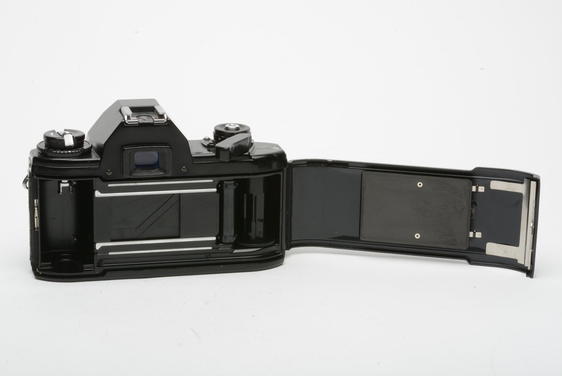 Nikon EM 35mm SLR body only, strap, cap, tested – RecycledPhoto