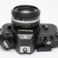 Nikon EM 35mm SLR w/Nikon 50mm f1.8 Series E lens, SB-E flash, case, cap, new seals++