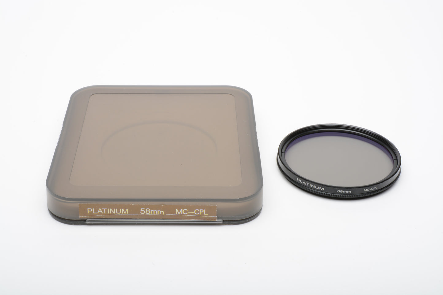 Platinum 58mm Circular Polarizing filter in jewel case, very clean