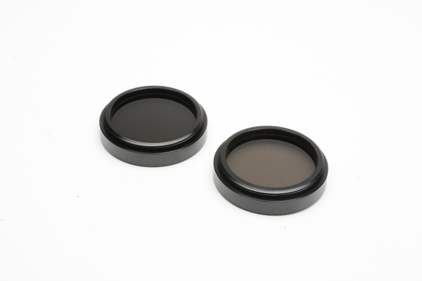 Nikon 28mm Neutral Density ND4 and ND8 filters in pouch, very clean