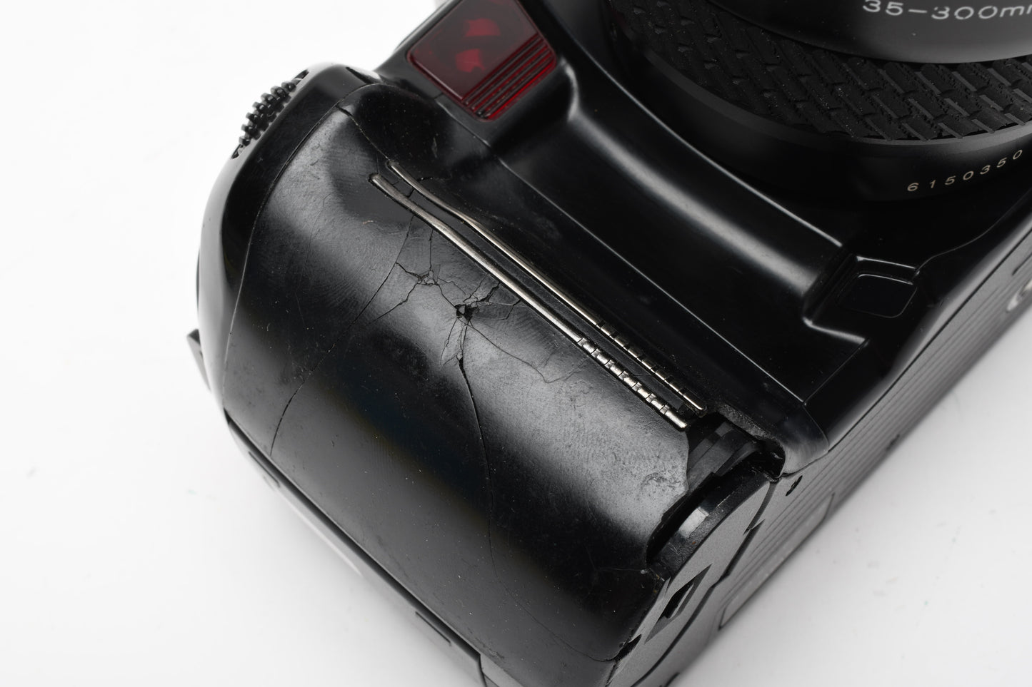 Minolta 700si QD 35mm SLR w/Tokina AF 35-300mm zoom, Bracket card, tested *Read