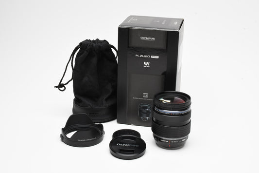 Olympus M. Zuiko Pro 12-40mm f2.8 lens , Hood, Pouch, Boxed, Mint-