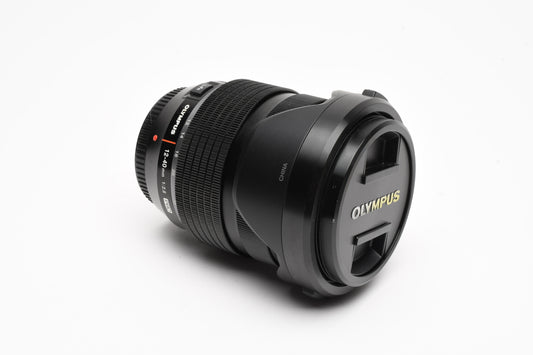 Olympus M. Zuiko Pro 12-40mm f2.8 lens , Hood, Pouch, Boxed, Mint-