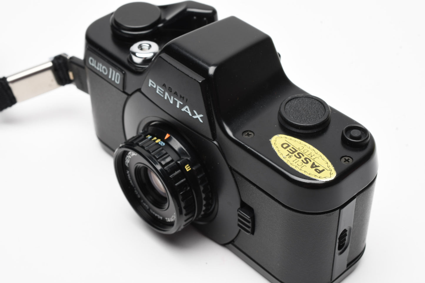 Pentax Auto 110 w/24mm f2.8, case, wrist strap, +AF130P Flash, Tested