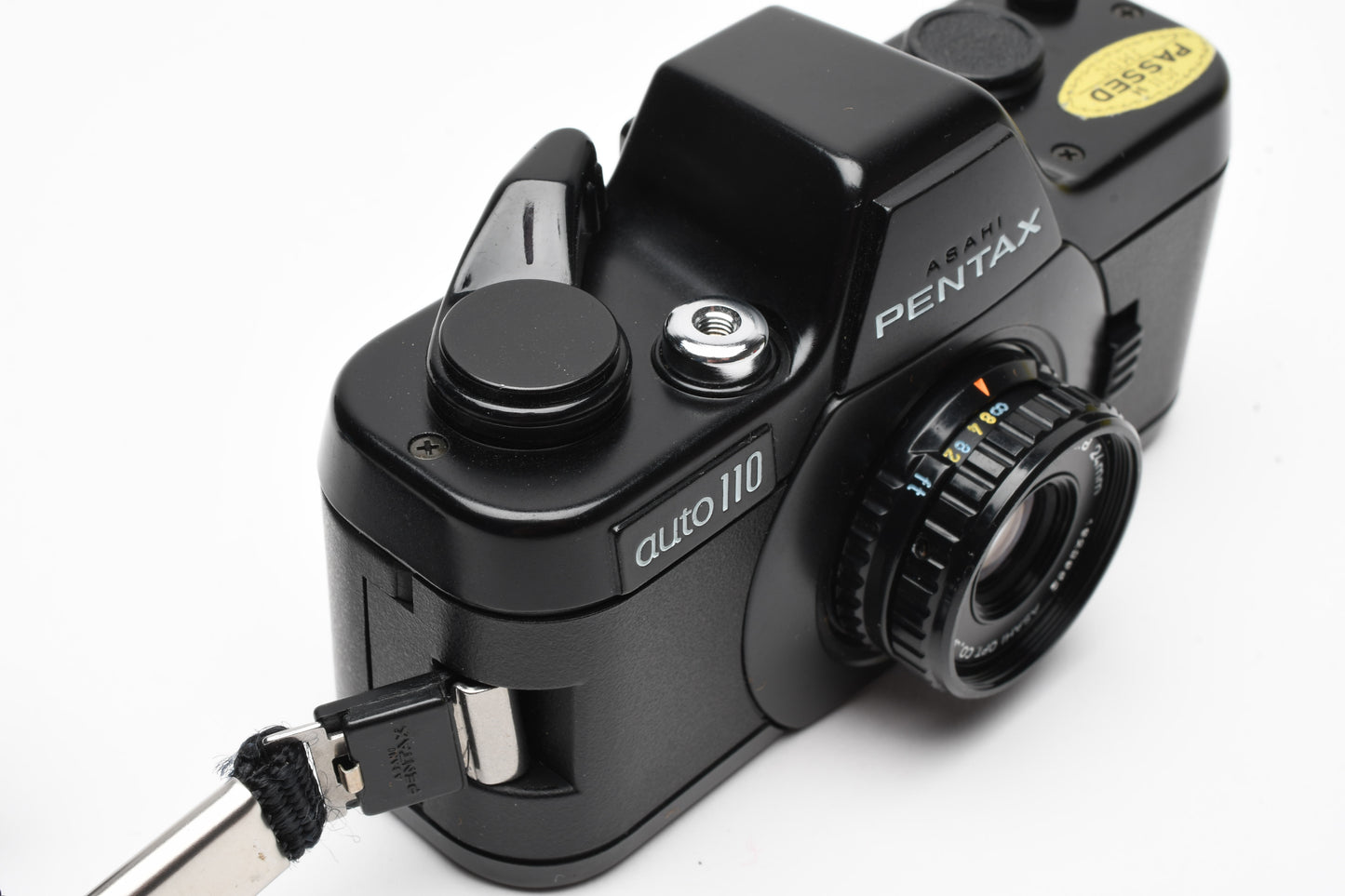 Pentax Auto 110 w/24mm f2.8, case, wrist strap, +AF130P Flash, Tested