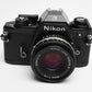 Nikon EM 35mm SLR w/Nikon Nikkor 50mm f1.8 lens, strap, cap, UV, CR, new seals