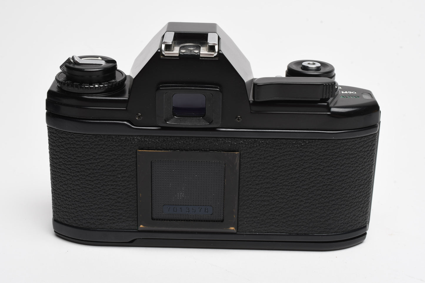 Nikon EM 35mm SLR w/Nikon Nikkor 50mm f1.8 lens, strap, cap, UV, CR, new seals