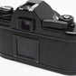 Nikon EM 35mm SLR w/Nikon Nikkor 50mm f1.8 lens, strap, cap, UV, CR, new seals