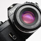 Nikon EM 35mm SLR w/Nikon Nikkor 50mm f1.8 lens, strap, cap, UV, CR, new seals