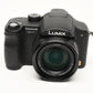 Panasonic Lumix DMC-FZ7 6MP Digital Point&Shoot Camera, case, adapter, hood