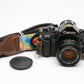 Canon A-1 35mm SLR w/50mm F1.8 lens, grip, strap, new seals, eyecup, tested