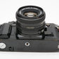 Canon A-1 35mm SLR w/50mm F1.8 lens, grip, strap, new seals, eyecup, tested