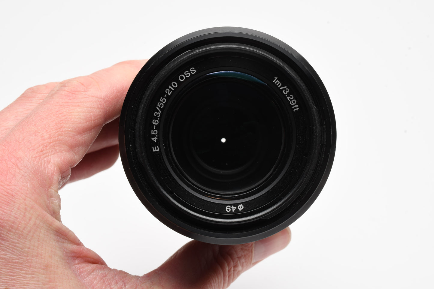 Sony 55-210mm f4.5-6.3 OSS zoom lens (Black) w/Lens caps, Lens hood