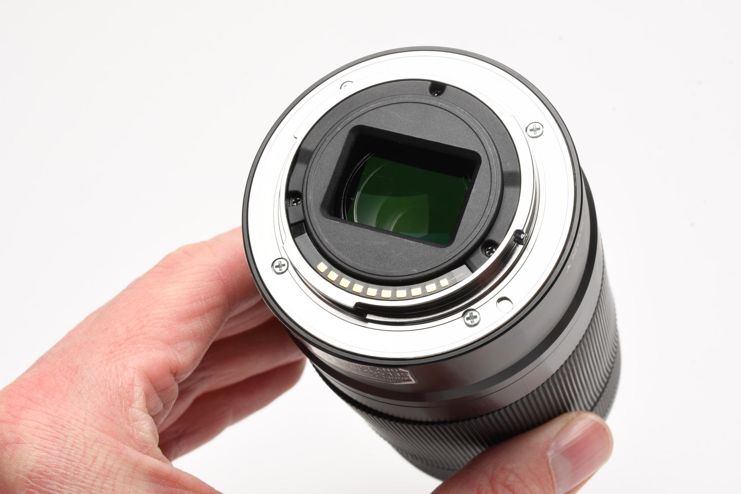 Sony 55-210mm f4.5-6.3 OSS zoom lens (Black) w/Lens caps, Lens hood