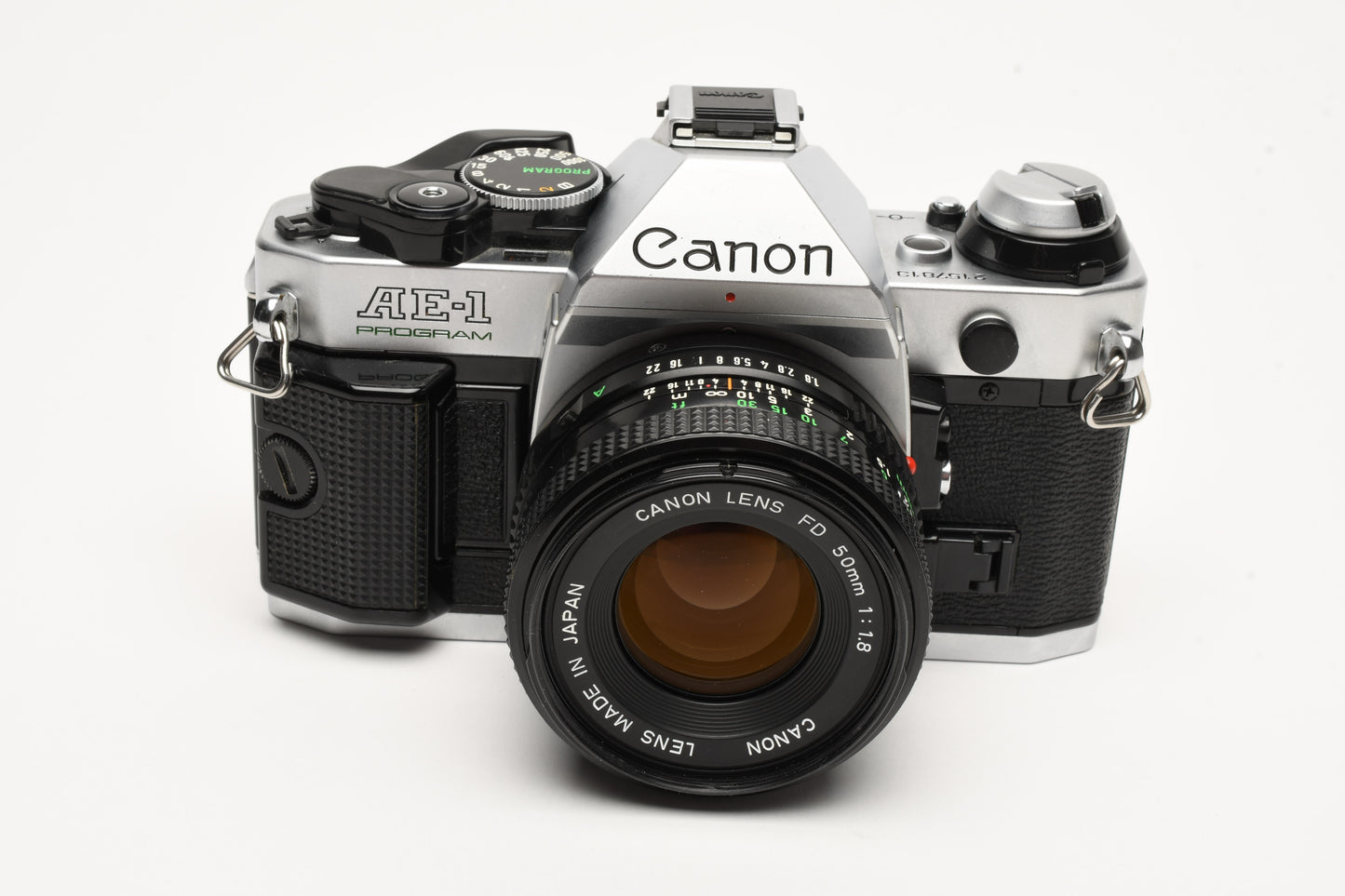 Canon AE-1 Program 35mm SLR Camera w/50mm f1.8, New Seals, Grip, UV