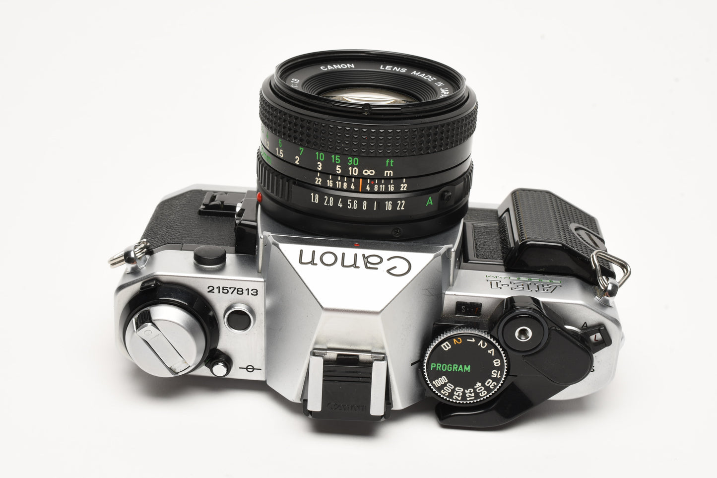 Canon AE-1 Program 35mm SLR Camera w/50mm f1.8, New Seals, Grip, UV