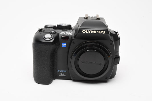 Olympus E500 DSLR body, batt+charger, clean, tested, nice + 512MB CF card