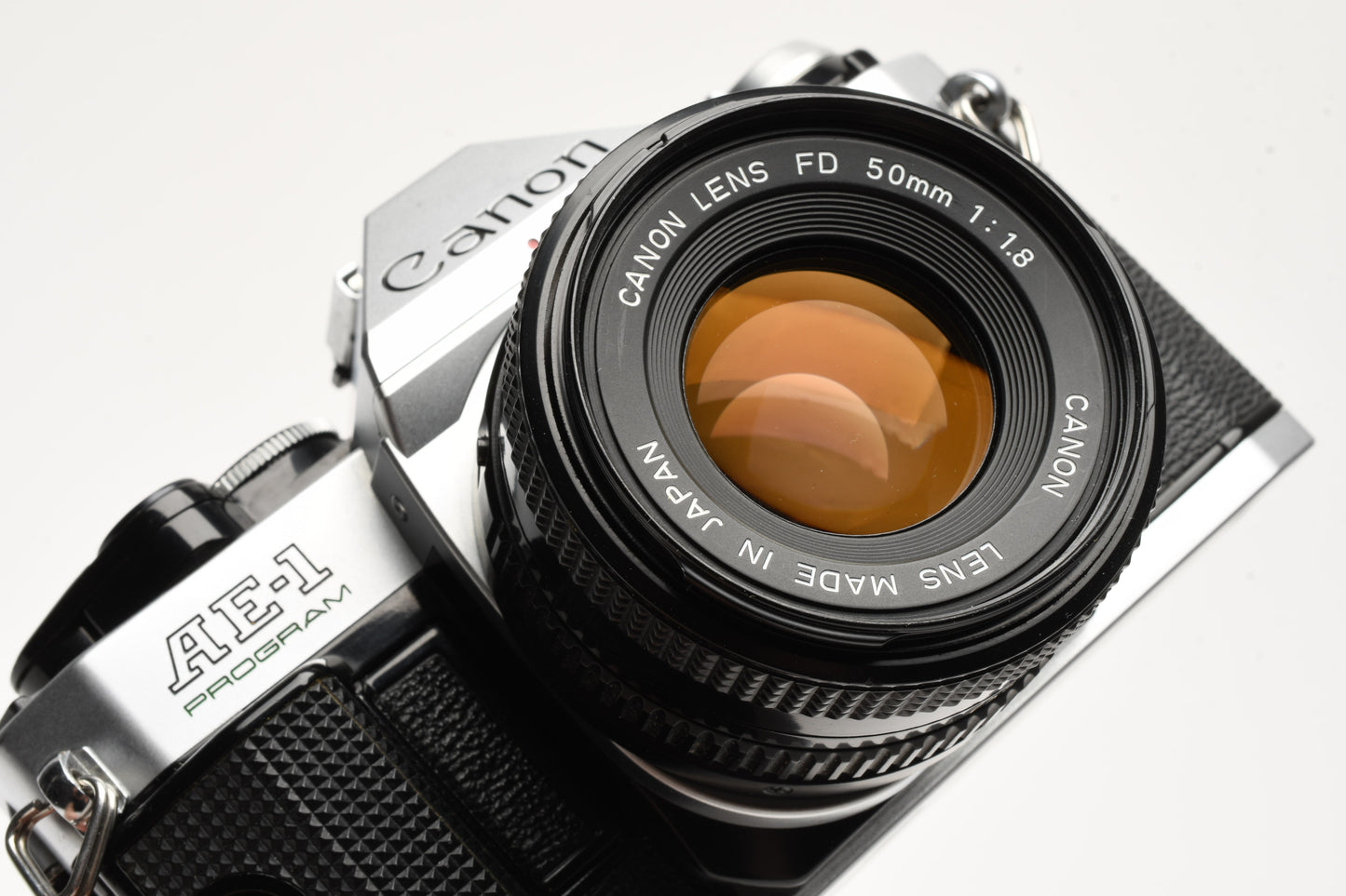 Canon AE-1 Program 35mm SLR Camera w/50mm f1.8, New Seals, Grip, UV