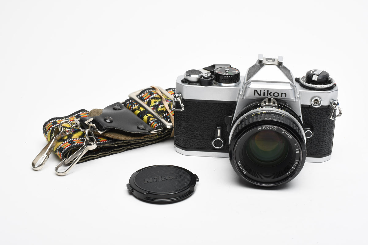 Nikon FE 35mm SLR w/Nikkor 50mm f1.8 Lens, Strap, New Seals, Great!