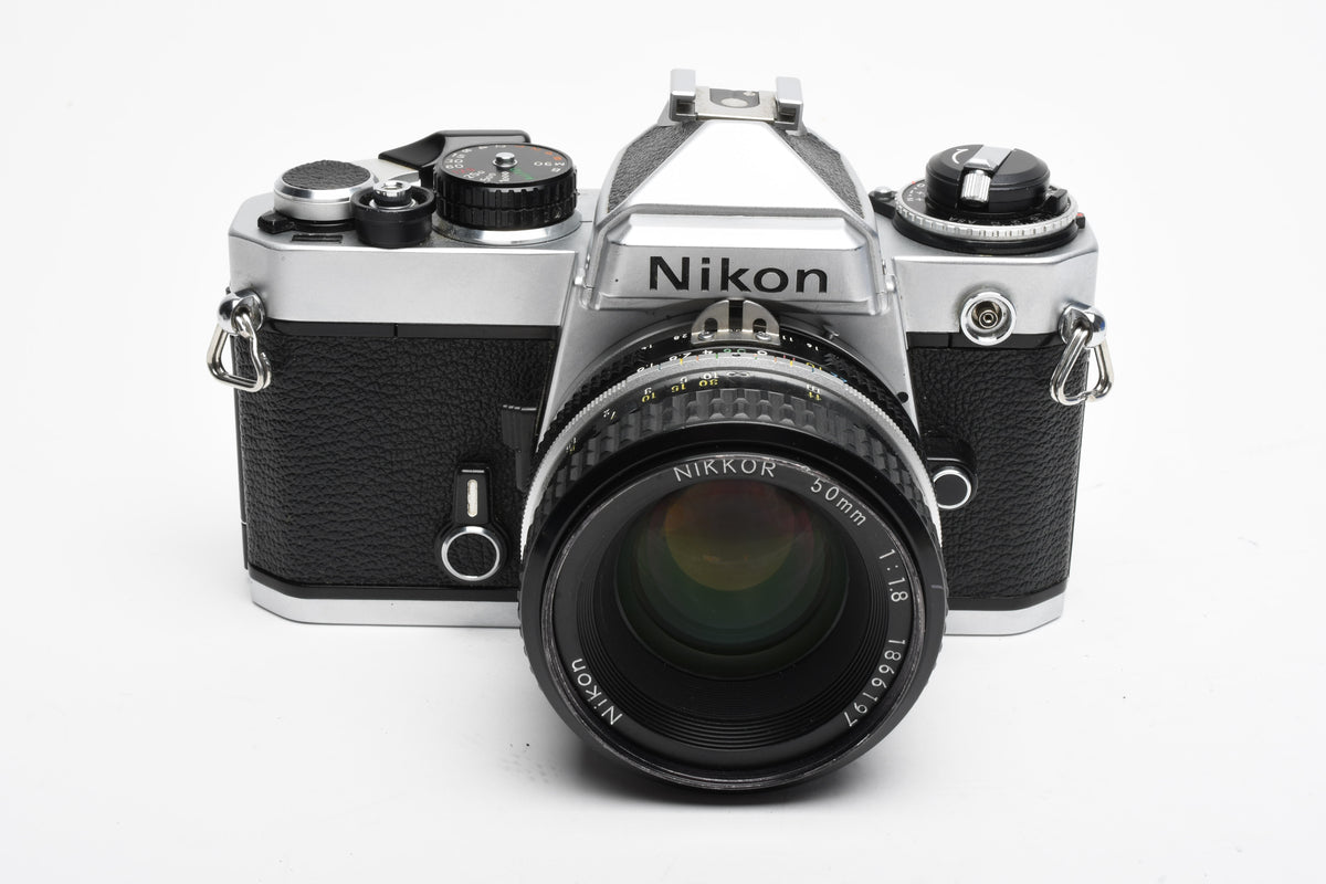 Nikon FE 35mm SLR w/Nikkor 50mm f1.8 Lens, Strap, New Seals, Great!