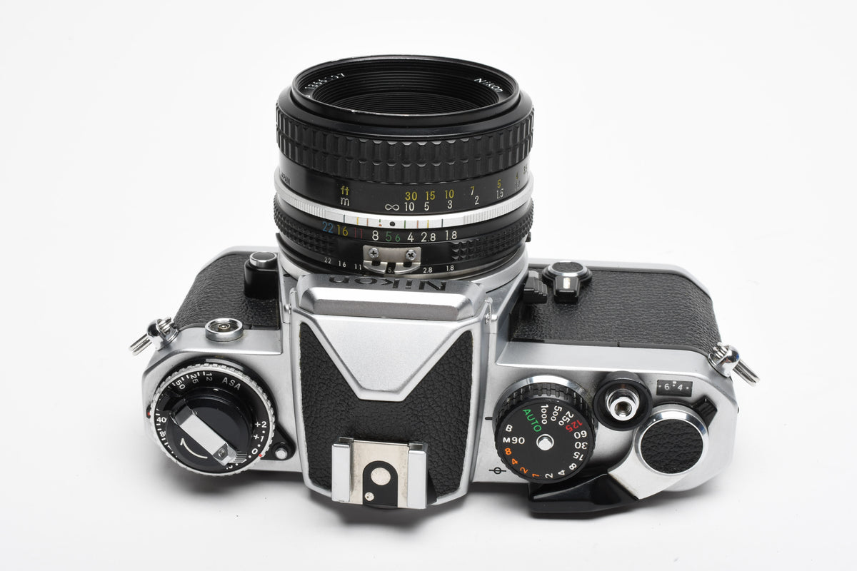 Nikon FE 35mm SLR w/Nikkor 50mm f1.8 Lens, Strap, New Seals, Great!