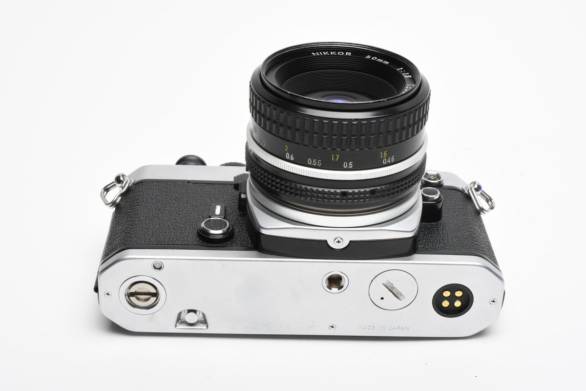 Nikon FE 35mm SLR w/Nikkor 50mm f1.8 Lens, Strap, New Seals, Great!