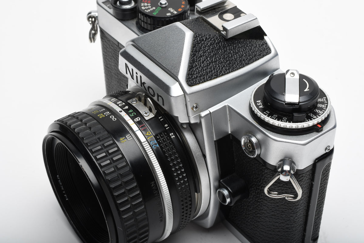 Nikon FE 35mm SLR w/Nikkor 50mm f1.8 Lens, Strap, New Seals, Great!